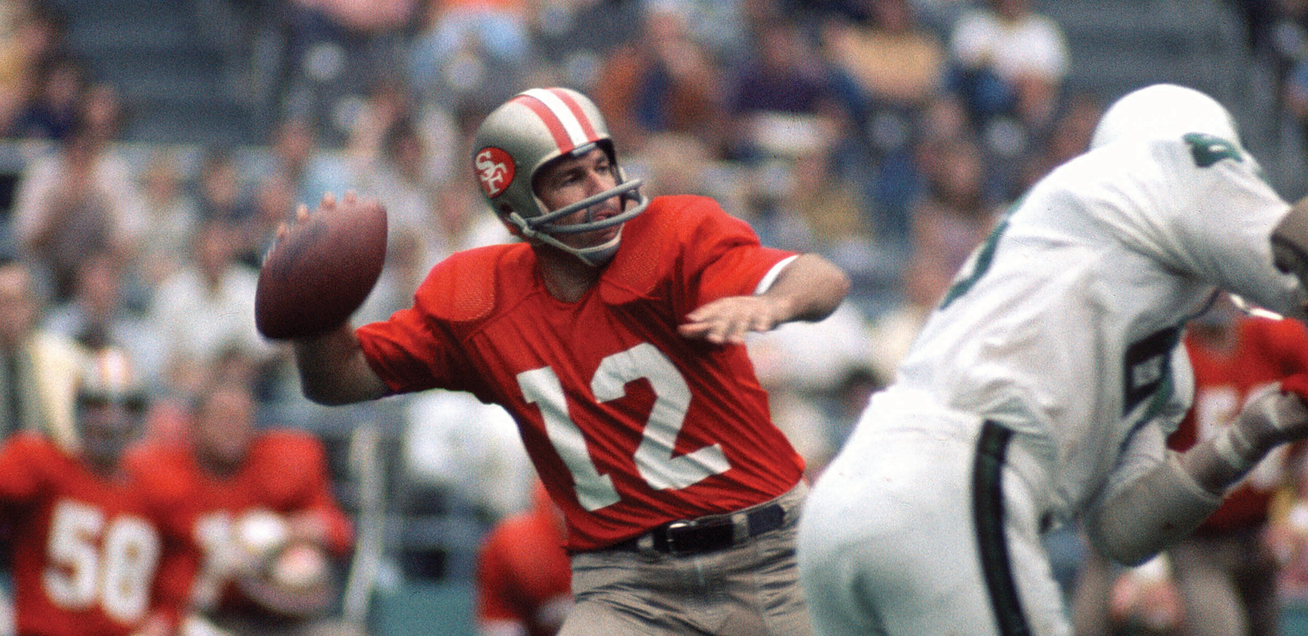 Quarterback John Brodie of the San Francisco 49ers gets dumped in